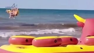 Tourist is Snapped Unconscious during Beach Ride gone Wrong (Slow Motion Added)