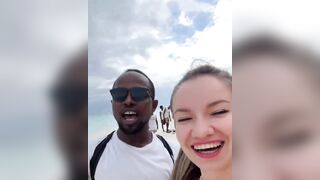 Now we have a Ukrainian woman on vacation in Africa. She seems very Happy