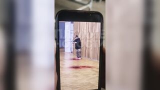 Man cuts his Throat in front of Onlookers at Airport. The man passed