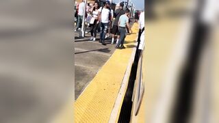 Big Black Man in All White tries to Kidnap Woman on NYC Subway in broad daylight..Finds Out