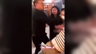 Woman hits man with bottle, see what happens next