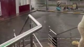 Brick balcony hits Woman during Hurricane (Slow Motion Added)