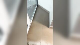 Brick balcony hits Woman during Hurricane (Slow Motion Added)