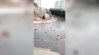 Brick balcony hits Woman during Hurricane (Slow Motion Added)