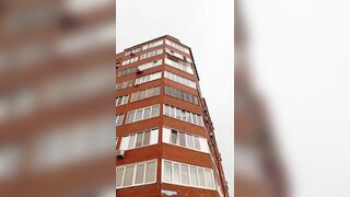 Brick balcony hits Woman during Hurricane (Slow Motion Added)