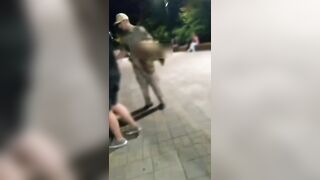 Half Naked Crazy Russian Woman decides to entertain then attack cameraman