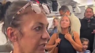 Fight breaks out on plane after female lawyer is accused of cutting the line