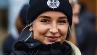 Photographer makes female officers smile with his photos of them