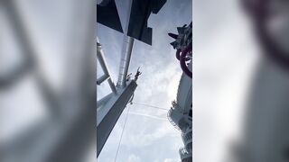 Dare devil jumps from a high spot in to a swimming pool !
