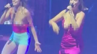 Spanish singers are getting their boobs out during their show