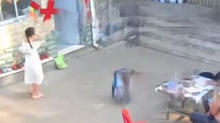 A girl was about to enter her home when she was swallowed by a terrifying "fire dragon" and thrown away