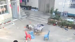 A girl was about to enter her home when she was swallowed by a terrifying "fire dragon" and thrown away