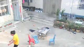 A girl was about to enter her home when she was swallowed by a terrifying "fire dragon" and thrown away