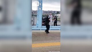 In the US, a cop beat up liberals who blocked a road protesting the actions of the Immigration Service.