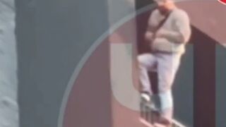A man parachuted from a balcony.