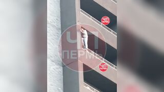 A man parachuted from a balcony.
