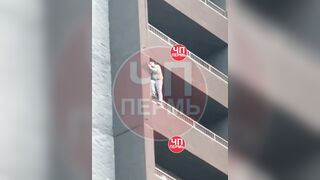 A man parachuted from a balcony.