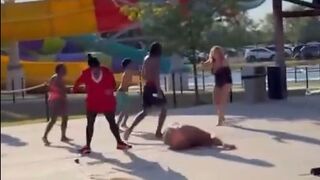 Fight Breaks Out at 'Wet n' Wild' as Little Kids Watch a Male Assault a Female