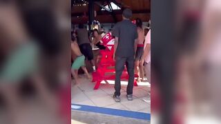 Fight Breaks Out at 'Wet n' Wild' as Little Kids Watch a Male Assault a Female