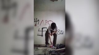 New Trend: zoomers start burning Russian flags against the backdrop of Nazi symbols