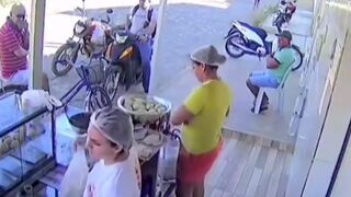 Watch the Female Employee in the Yellow Shirt (2 Angles)