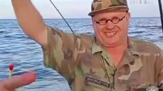 Fisherman shows Off his "Unusual "Catch of the Day"