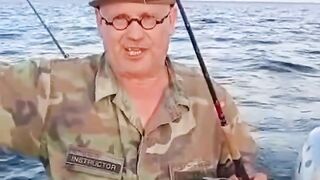 Fisherman shows Off his "Unusual "Catch of the Day"