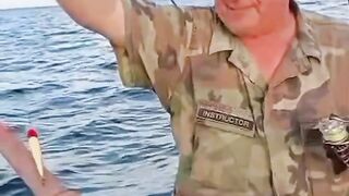 Fisherman shows Off his "Unusual "Catch of the Day"