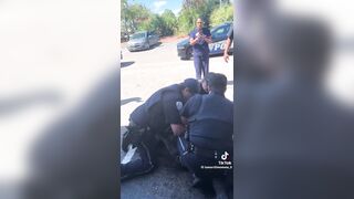 Charleston, NC - The suspect doing the usual. Cop trying tot do his job