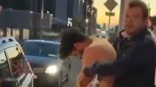 Migrant free punches after he pulled a knife on people waiting at the tram stop