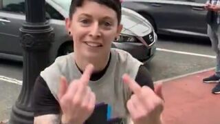 A woman loses her mind over a banner that simply defines what a woman is