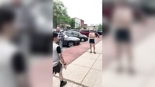 A woman loses her mind over a banner that simply defines what a woman is