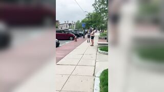 A woman loses her mind over a banner that simply defines what a woman is