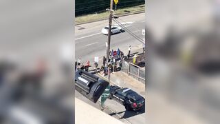DHS Secretary Kristi Noem stares down group of Antifa and a guy in a chicken suit