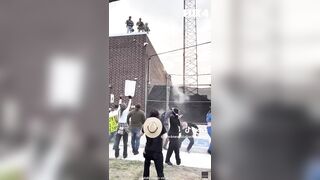 Troublemaker Disguised as a Priest Shot in The Head With A Pepper Ball..