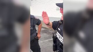 Man trying to file a complaint against a business confronts a police officer