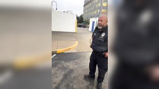 Man trying to file a complaint against a business confronts a police officer