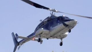 NEW: Man nearly hit by a helicopter that crashed in Huntington Beach California