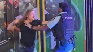 Man blocking Sydney tram gets into a fight with police officers