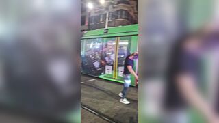 Man blocking Sydney tram gets into a fight with police officers