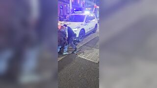 Man blocking Sydney tram gets into a fight with police officers