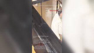 Woman grew tired of a man in a wig holding up the train