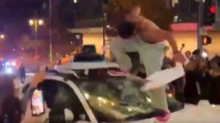 LAPD stand around as hundreds of skateboarders destroy downtown Los Angeles