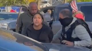 Woman thought having kids in her car would shield her from arrest while she impeded ICE operations