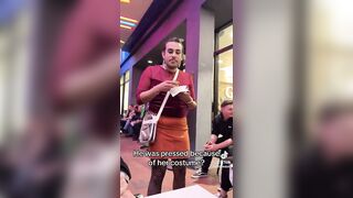 A man dressed as a woman attacks a woman dressed as a native American