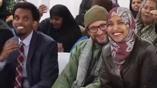 Ilhan Omar campaigning for Omar Fateh in MN. 0 American flags. 0 English.