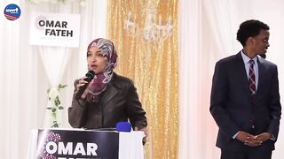Ilhan Omar campaigning for Omar Fateh in MN. 0 American flags. 0 English.