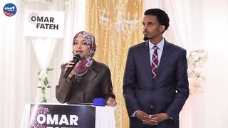 Ilhan Omar campaigning for Omar Fateh in MN. 0 American flags. 0 English.
