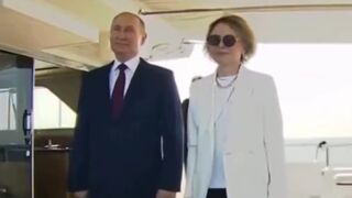 Classic: Putin gesturing a female host not to speak while the national anthem is being played. Meanwhile the USA is collapsing