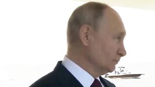 Classic: Putin gesturing a female host not to speak while the national anthem is being played. Meanwhile the USA is collapsing